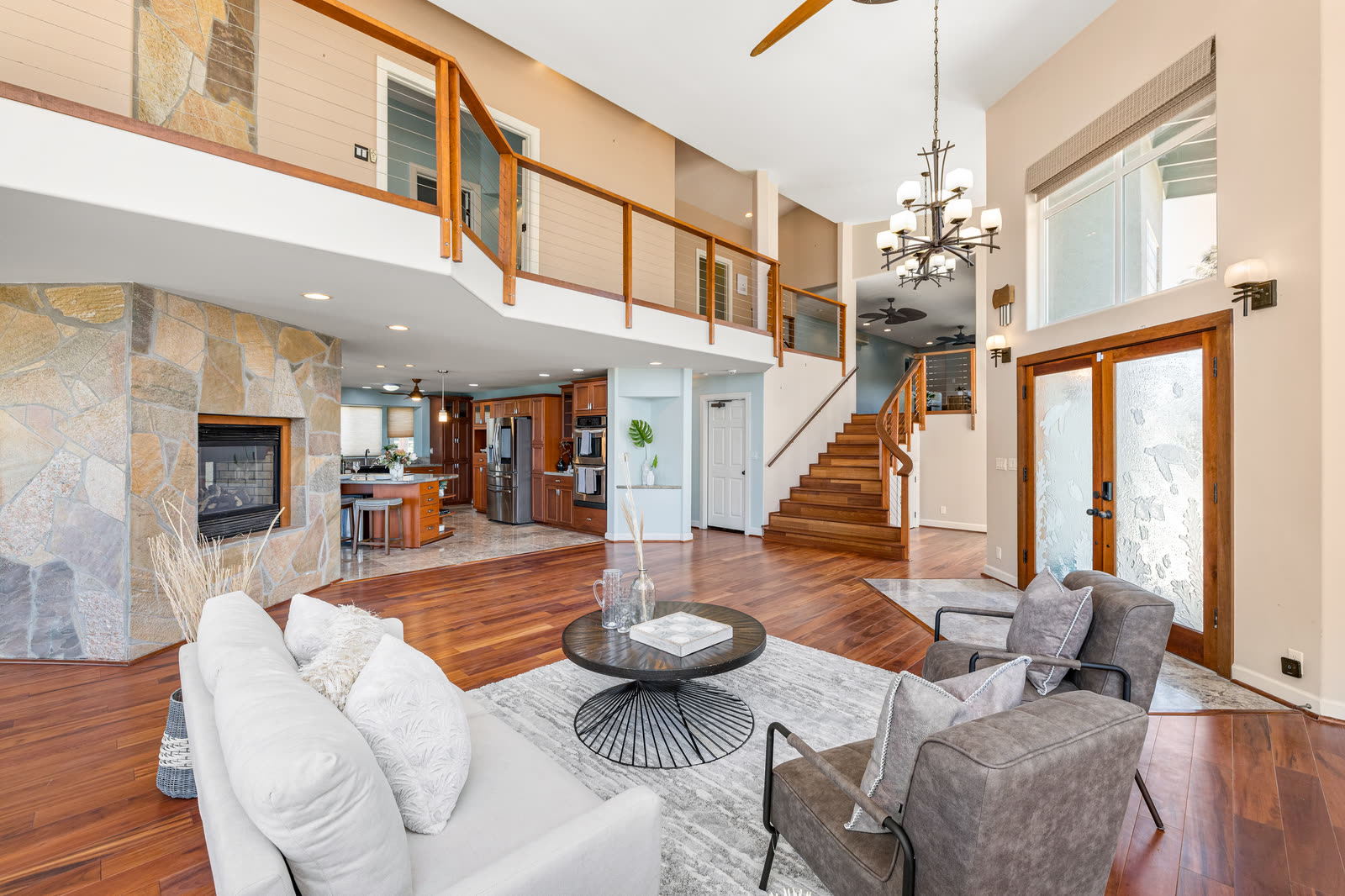 Two-story living room and staircase