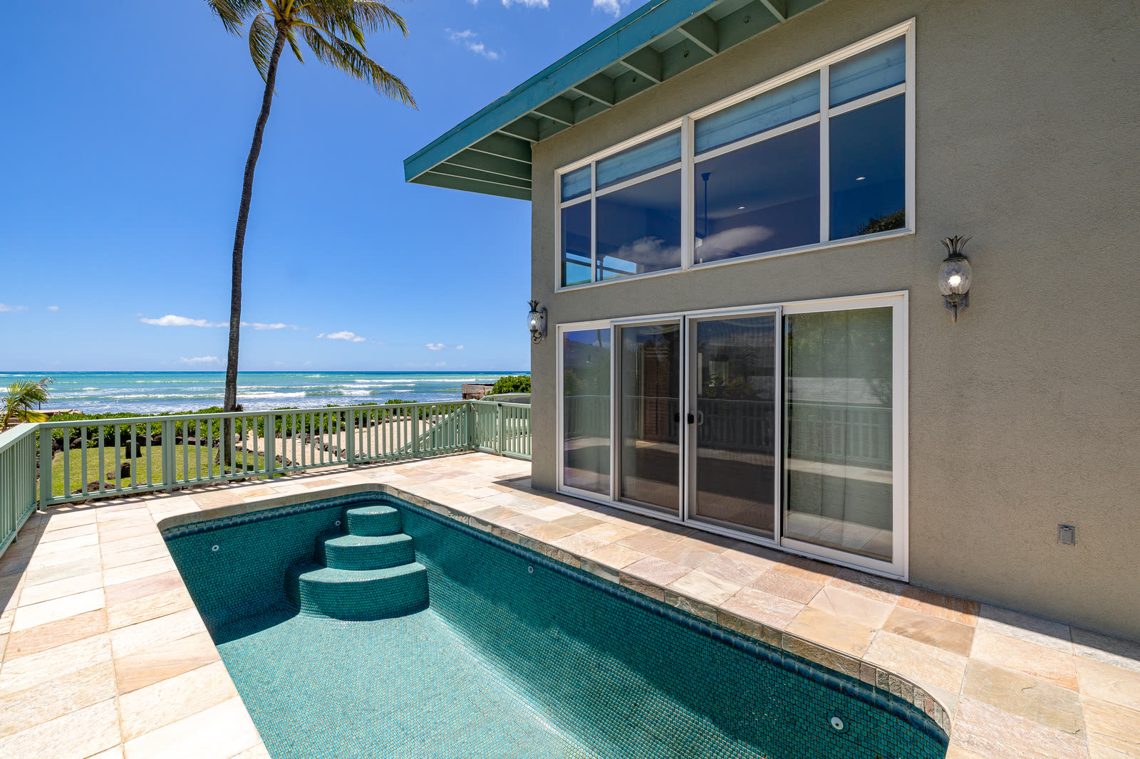 Pool with ocean beyond